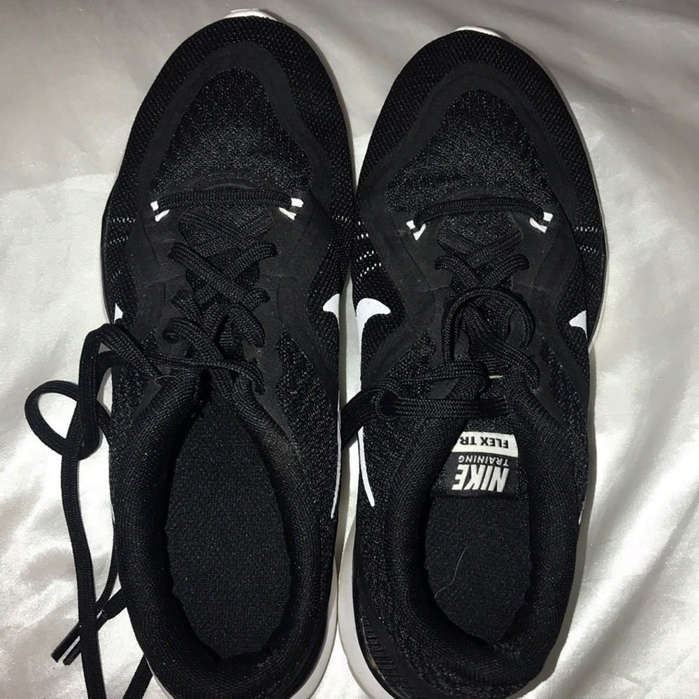 Black Nike training shoes